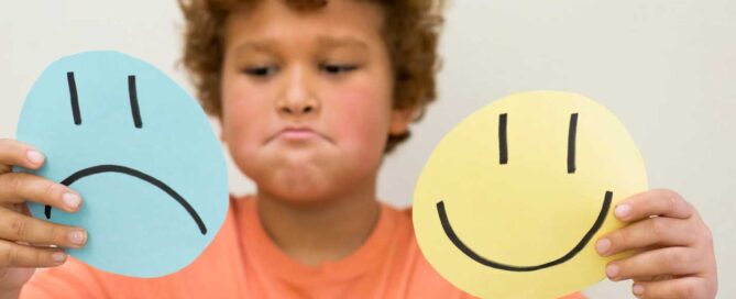A boy using Visual Supports during an ABA Therapy Miami session.