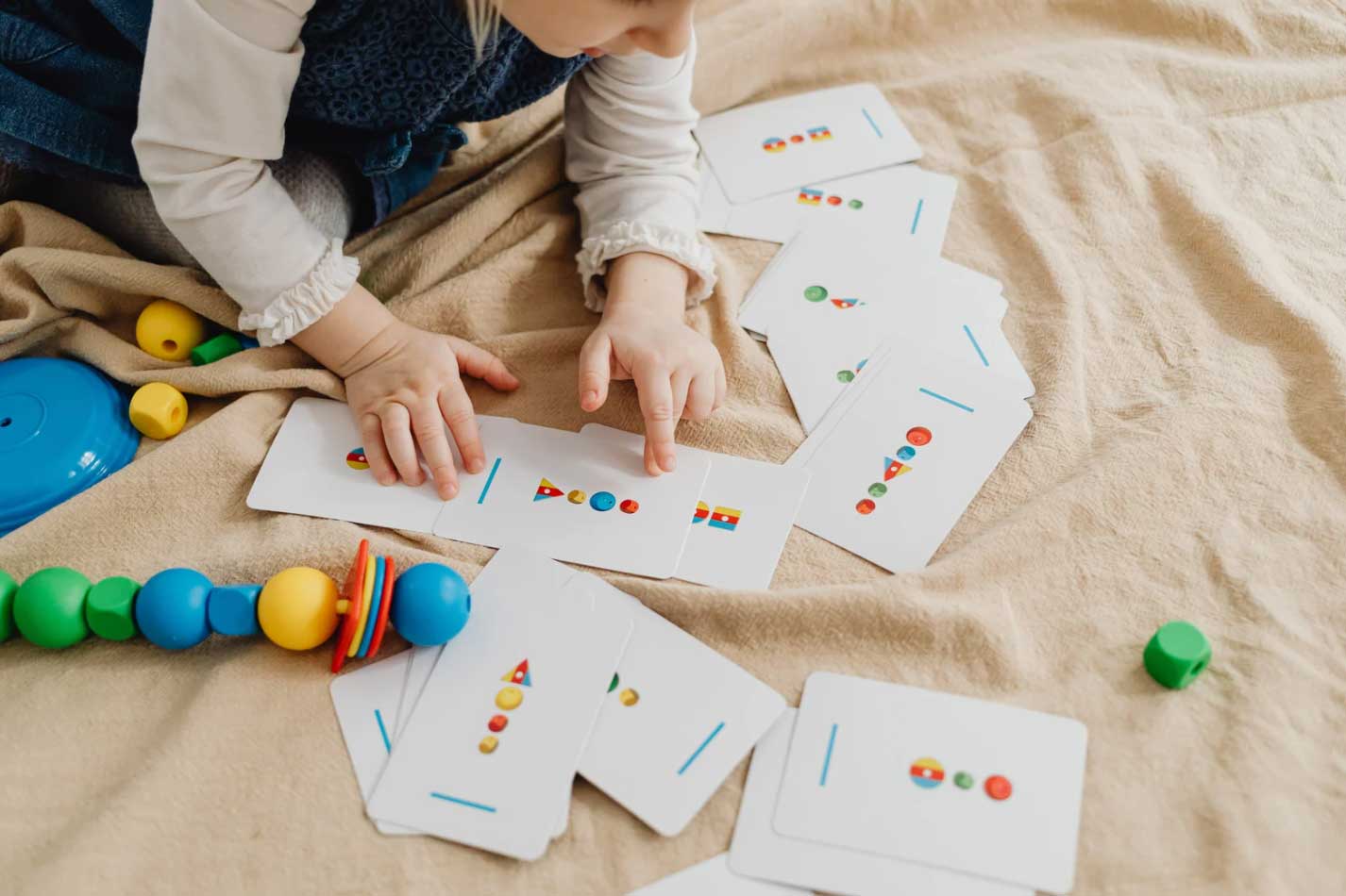 A young girl using Visual Supports during her ABA therapy session in Miami, Florida.